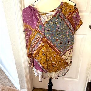 Bella B v- neck top . Multi muted pastel colors